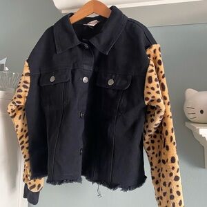 For all seasons black denim jacket with animal print sleeves